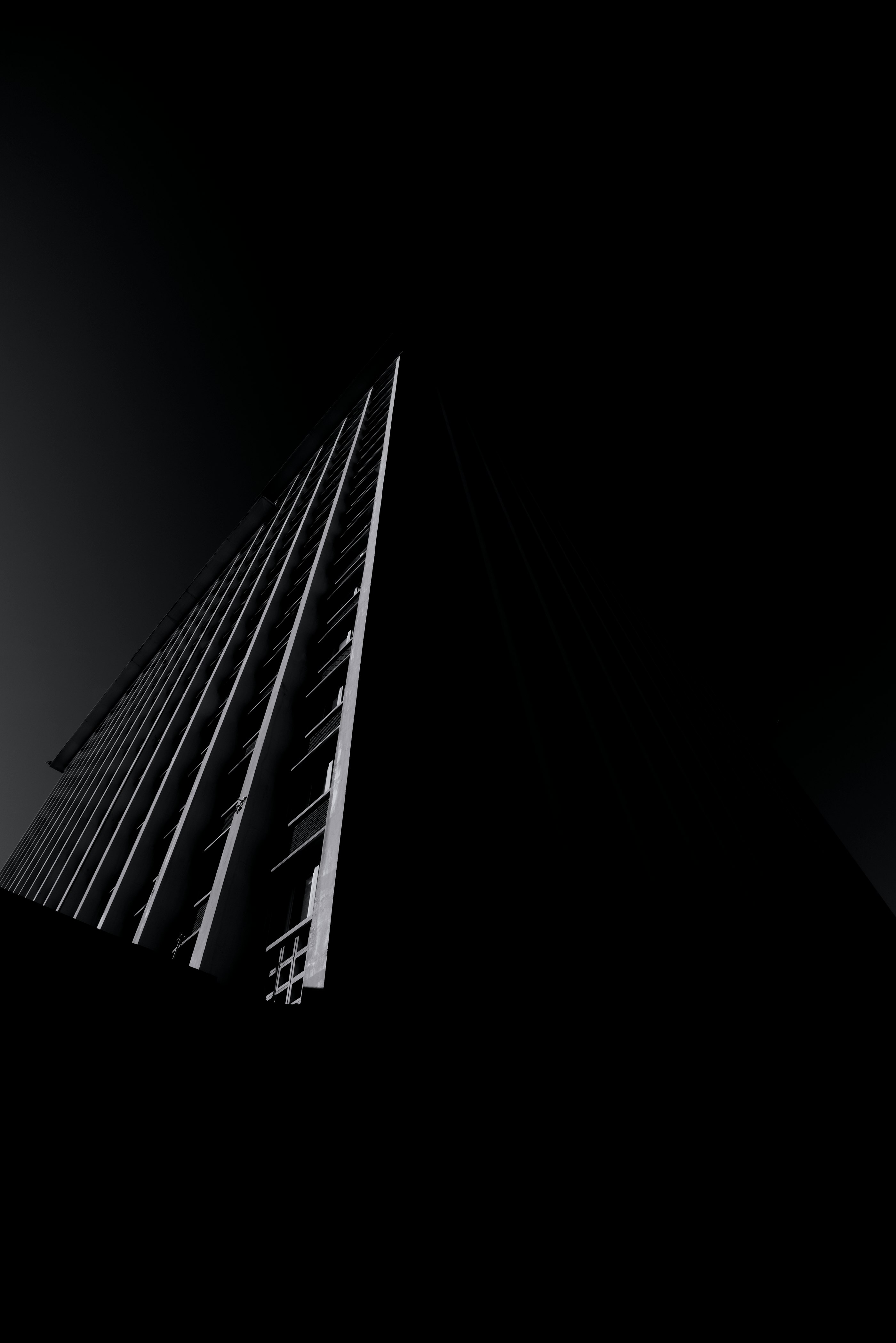 grayscale photo of high rise building